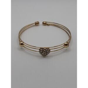 Heart shaped CZ gold toned open bracelet 7"